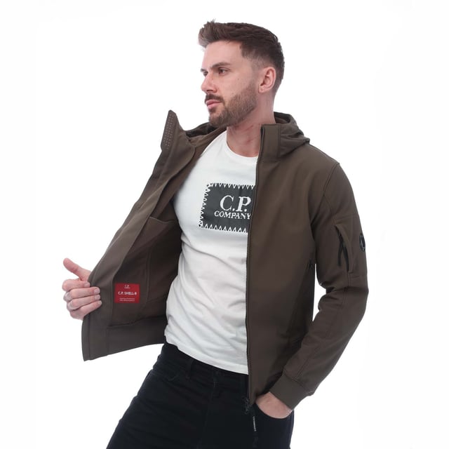 Heren C.P. Company Shell-R Google Jacket in groen.- Verstelbare capuchon met goggle.- Volledige ritssluiting.- Beveiligde voorzakken.- Verstelbare zoom.- 94% Polyester 6% Elastane.- Ref: 17CMOW013A683
