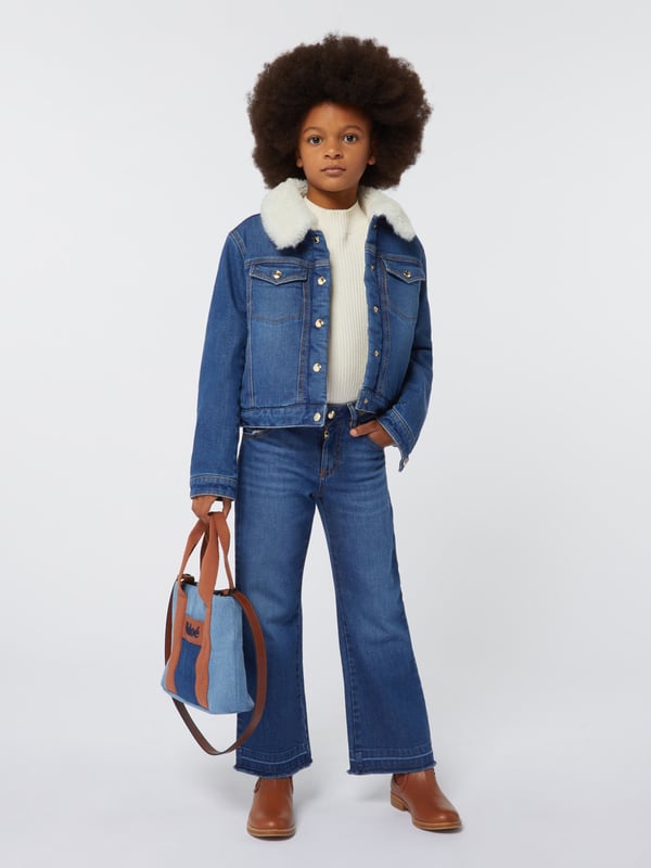 Parisian label Chloé incorporate exquisite materials in their beautifully crafted abstracts. These girls wide leg denim blue jeans are reflective of the French label's preference for sleek, innovative designs. Envisioned in a traditional five-pocket style via organic cotton with an adjustable waist, Chloé engraved snap and contrasted topstitching. They showcase fringes on the bottom leg with a brut effect and Chloé embroidery on a front belt. Mini Me 99% Cotton, 1% Elastane