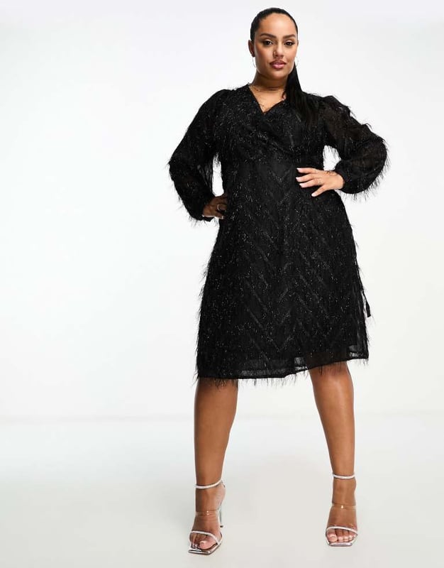 Dresses by Vila Curve Dress the part Textured finish Wrap front Volume sleeves Regular fitSold By: Asos