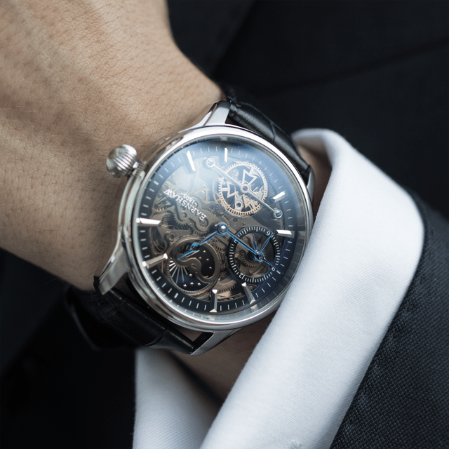 Drawing inspiration from the lines of Longitude, once the most crucial tool in navigating the seas, a large, classically formed case exhibits a complex yet precise piece of timekeeping mastery.