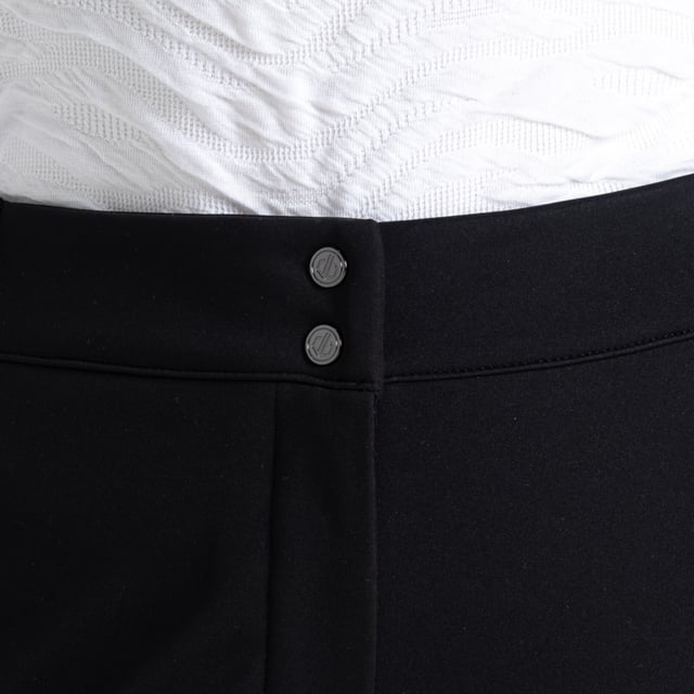 The Women's Sleek III Pant. Consciously made with our advanced recycled iLUS D-Lab Stretch Softshell, you'll have total wind and water protection on the slopes, plus breathability to keep you fresh. The women's ski pants also feature a 4-way stretch, allowing you to twist and turn with ease. Function meets style with these ladies ski trousers, and you'll stay on trend with the tapered leg fit. Recycled polyester waterproof softshell fabric - Ilus D-Lab Softshell. Water repellent finish. Tapered leg fit. Black colourway is available in regular and short leg lengths - please see size chart for details.