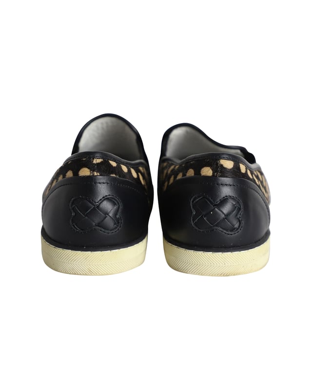 VINTAGE, RRP AS NEW
Polka-dot detail adds a playful touch to these slip-on sneakers by Bottega Veneta. Designed in pony-style calfskin leather and finished with an elastic panel on the vamps for easy slip-on and off. A stylish everyday casual sneaker you can pair with jeans and day dresses alike.

Bottega Veneta Polka-dot Pony-style Slip-on Sneakers in Black Calfskin Leather
Condition: Excellent
Sign of wear: No visible defects
Material: Calfskin leather
Color: Black
Size: IT38.5 / UK5.5 / US8.5
SKU: 286855