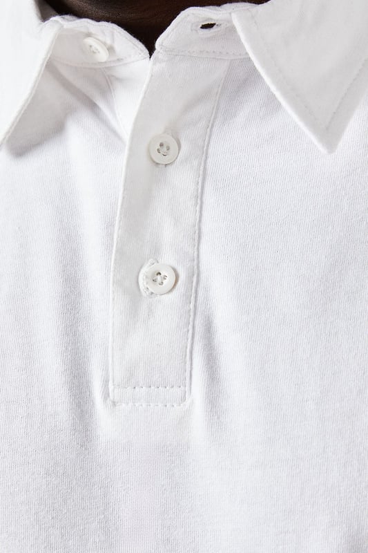 Classic regular fit polo design
        Short sleeves for warm-weather comfort
        Ribbed collar for a polished look
        Three-button placket for adjustable style
        Versatile solid colour for easy pairing
    
    This Burton regular fit polo shirt is the epitome of casual sophistication, perfect for the modern gent who values both style and comfort. Ideal for a variety of occasions, from casual Fridays at the office to weekend outings with mates, this polo effortlessly bridges the gap between relaxed and refined. The regular fit offers ample room for movement, making it a go-to choice for active days or leisurely pursuits. Style it with chinos and trainers for a smart-casual look that's spot-on for a pub lunch or family gathering. For a more laid-back vibe, pair it with your favourite jeans and a lightweight jacket. The versatility of this polo makes it a wardrobe essential, easily transitioning from daytime errands to evening catch-ups with friends. Its timeless design ensures you'll look put-together without trying too hard, embodying the effortless style that Burton is known for.