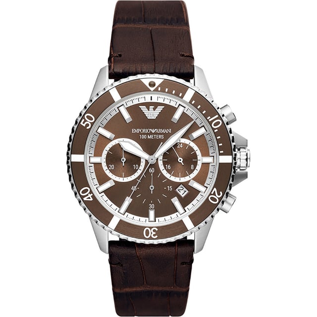 This Emporio Armani Diver Chronograph Watch for Men is the perfect timepiece to wear or to gift. It's Silver 43 mm Round case combined with the comfortable Brown Leather watch band will ensure you enjoy this stunning timepiece without any compromise. Operated by a high quality Quartz movement and water resistant to 10 bars, your watch will keep ticking. This Elegant and practical watch is perfect for all occasions. It’s a great gift for your relatives and friends -The watch has a calendar function:  Date , Stop Watch , 24-hour Display , Luminous Hands and Luminous Numbers High quality 21 cm length and 22 mm width Brown Leather strap with a Buckle Case diameter: 43 mm,case thickness: 12 mm, case colour: Silver and dial colour: Brown