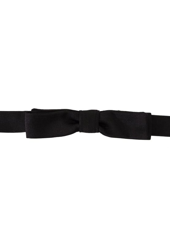 100% Authentic Dolce & Gabbana bow tie
  Exclusive item from the Dolce & Gabbana collection
  Color: Black
  Model: Tied
  Material: 100% Silk
  Adjustable length neck strap
  One size fits all
  Made In Italy