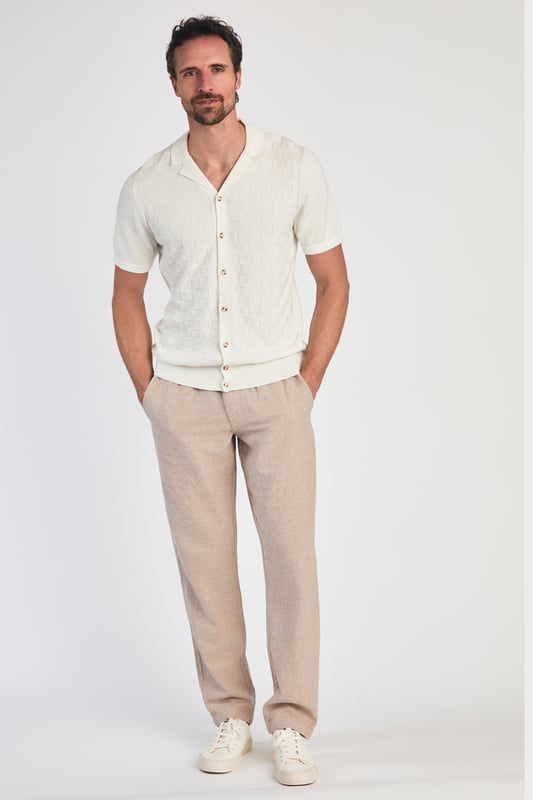 This knitted shirt from Kensington Eastside is a perfect mix of style and comfort. With a subtle checked pattern on the front and a laid-back Cuban collar, it’s an easy go-to for smart-casual outfits. Lightweight and breathable, it’s great for any occasion where you want to look sharp with minimal effort.