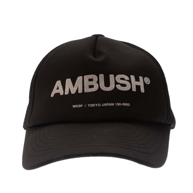 Mens Ambush Classic Logo Cap in black - white.- Trucker cap.- Curved brim.- Stretch technical fabric to front.- Mesh rear panels.- Adjustable back strap.- Ambush logo printed to front.- One size.- Fabric 1: 91% Polyester  9% Polyurethane.  Fabric 2: 100% Polyamide.  Lining: 100% Cotton.  Hand wash.- Ref: BMLB0030011003
