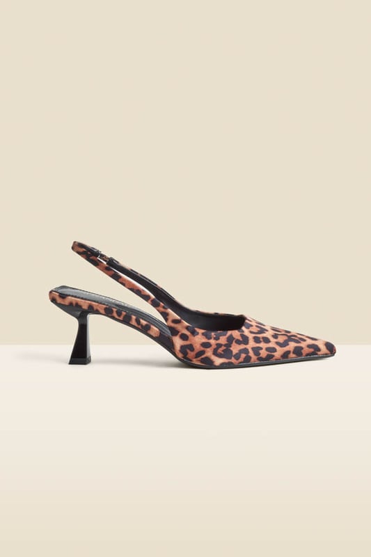 We're obsessed with them too Crafted from luxe crinkle leather in a stunning cherry red patent finishChic slingback with an elasticated insert for a comfortable fit Sexy pointed toe silhouetteSet on a super-wearable flared kitten heel We love them with jeans and a blazer