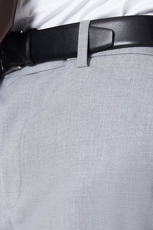 Introducing our Essential Tailored Fit Smart trousers, a must-have addition to your wardrobe. These trousers features a zip fly fastening for convenience and is designed to provide a sleek and polished look. Made with a polyester viscose blend with added stretch ensures a cool and comfortable fit all day long. Pair these versatile trousers with matching items, perfect for any smart occasion.