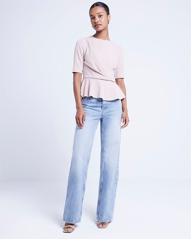 ​Front twist detail, Crew neckline, Short sleeves, Peplum hem
