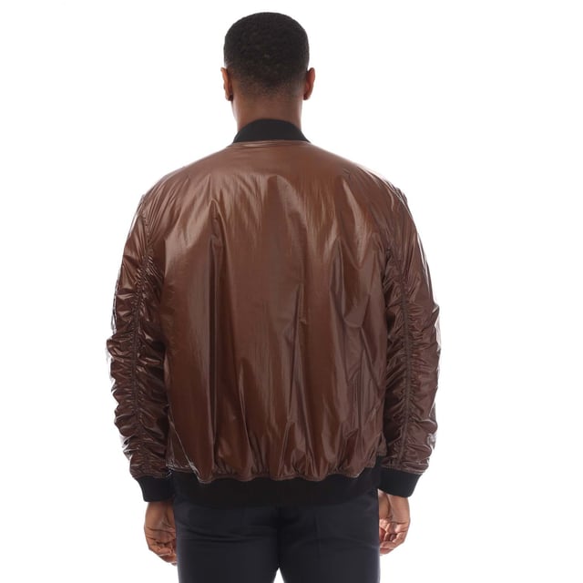 Mens HUGO Byler2431 Jacket in brown.- Ribbed bomber style collar.- Branded full front zip opening.- Two press stud entry pockets.- Zip entry pocket situated on the upper left sleeve.- Signature HUGO logo is printed on the chest.- All over padded design.- Ribbed cuffs and hem.- 100% Polyamide.- Ref: 50521233890
