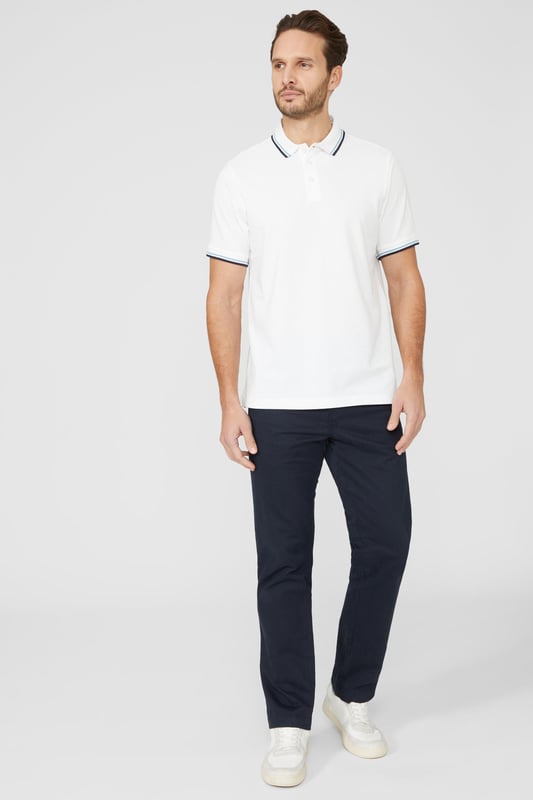 Introducing our Pique Tipped Polo, the perfect addition to any man's smart casual wardrobe. Crafted with meticulous attention to detail, this polo offers a sophisticated and polished look. The pique fabric provides a comfortable and breathable feel, making it ideal for all-day wear. With its stylish tipped collar and cuffs, this polo adds a touch of elegance to any outfit. Whether you're heading to the office or out for a casual gathering, our Pique Tipped Polo is the ultimate choice for a smart and effortlessly stylish look.