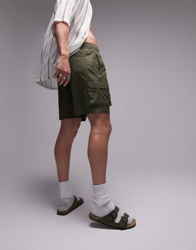 Swimwear by Topman Welcome to the next phase of Topman Regular rise Drawstring waistband Functional pockets Eyelet drains Skinny fitSold By: Asos
