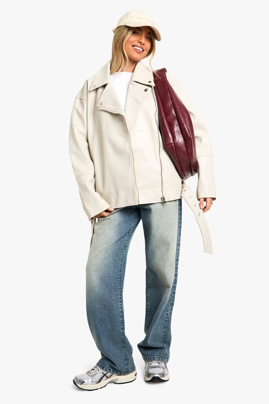 A short, close-fitting jacket complete with zips and stud detailing, rock some seriously cool vibes on the day-to-day with a biker jacket. Whether you prefer cropped, longline or a classic oversized shape for vintage vibes, biker jackets are a wardrobe classic that's perfect for edging up your outfit. Layer up your dress with a suede biker jacket, or show off your shape with a black biker jacket that's both timeless and flattering.Style: Faux Leather JacketFabric: Faux LeatherLength: LonglineSleeve Length: Long Sleeve