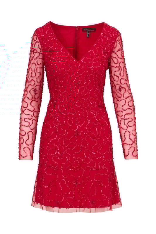 Ring in the evening with sparkle to spare in this playful sequin dress. This cocktail dress features a v-neckline, sheer long sleeves, and a soft skirt. Fully lined through the body, this long sleeve dress has a mesh overlay with swirls of sequin beading that is interspersed with clusters of tubed beading. A zipper back closure completes this beaded dress. Style this semi-formal dress with nude heels and a satin clutch to complete the look for a dressy night out or wedding guest duty.