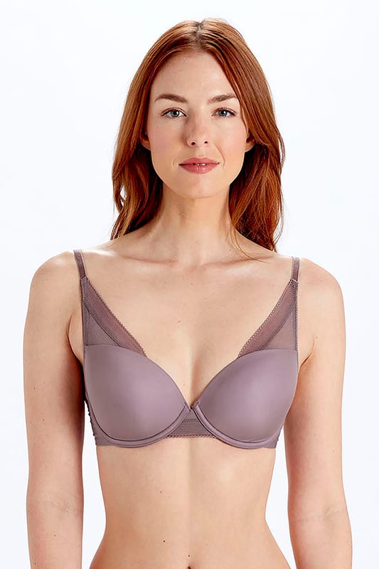 Our Naturals collection is made with a lightweight and breathable microfibre. An everyday essential, boasting wearable designs that make you look and feel great. A gorgeous soft hue, subtle but eye-catching. Our high apex moulded cup offers light padding and underwire to enhance your shape. This elegant t-shirt bra has mesh panel detailing and picot trims for a delicate and feminine feel.