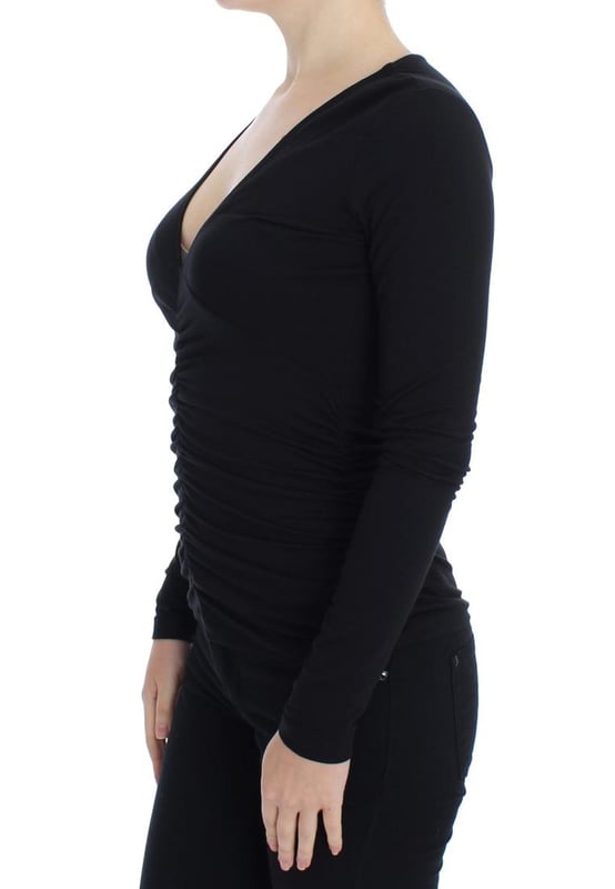 VERSACE JEANS Couture VJC
  Stunning Black V-Neck Pullover Sweater
  Brand new with tags
  Classic V-neck design
  Signature logo details
  Made in Italy
  Material: 95% Viscose 5% Elastane
  Gender: Women