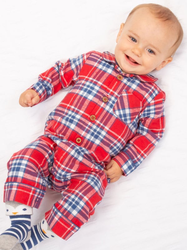 New! This soft and breathable romper is perfect for special days. With a red and navy plaid check design, navy piping detail and coconut button fastenings, it is both practical and pretty, and the perfect pick for little crawlers, walkers and wrigglers!