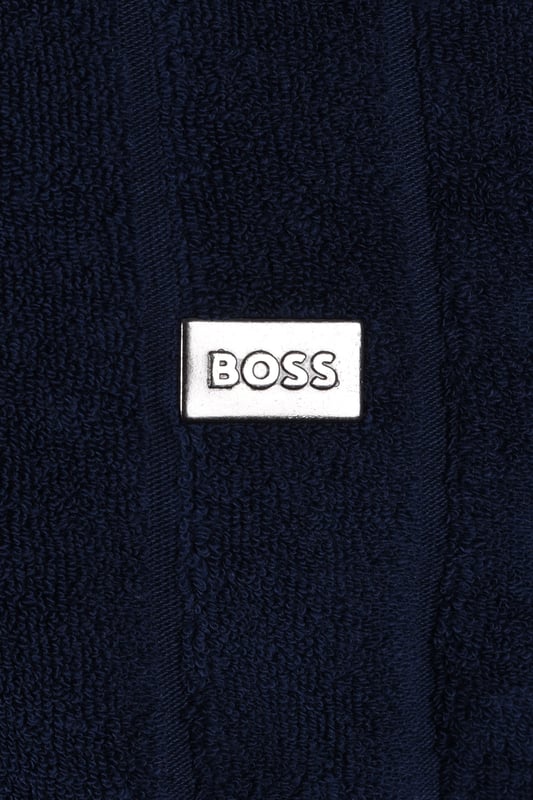 Boss Toweling Polo Shirt Navy
A super relaxed beach-side polo that is a must for the holidays and warmer seasons. made from a terry toweling and boasting the ever summery resort collar, metal logo hardware and subtle BOSS striping.

Toweling Polo
Relaxed Fit
Style - 50508847