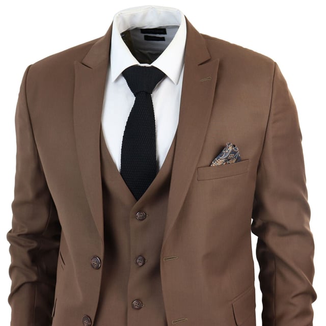 Indulge in Classic and Elegant Design with this men's 3-piece suit, featuring a timeless Brown color ideal for formal occasions. Product Design Bullet Points:  
Versatile Formal Attire: Suitable for weddings, business events, or special occasions, ensuring a sharp and well-dressed look.
 
Complete 3-Piece Set: Includes a jacket, vest, and trousers for a polished and coordinated outfit.
 
Premium Material: Crafted from high-quality materials for comfort and durability.
 
Tailored Fit: Offers a tailored fit that complements your body shape, enhancing your appearance and confidence.
 
Timeless Brown Color: Perfect for a classic and sophisticated look, suitable for various formal settings.  Â Made from a blend of 65% Polyester and 35% Viscose for a comfortable and stylish finishSizes	Jacket & Trouser Size
36R :	36" (Chest) 30" (Waist)
38R :	38" (Chest) 32" (Waist)
40R :	40" (Chest) 34" (Waist)
42R : 	42" (Chest) 36" (Waist)
44R :	44" (Chest) 38" (Waist)
46R : 	46" (Chest) 40" (Waist)
48R :	48" (Chest) 42" (Waist)
50R :	50" (Chest) 44" (Waist)
52R :	52" (Chest) 46" (Waist)
54R :	54" (Chest) 48" (Waist)