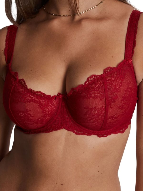 Aubade Danse Des Sens Half Cup Bra. With reinforced back construction, lycra lace trim/strip and a satin bow detail. The product is hand-wash only.