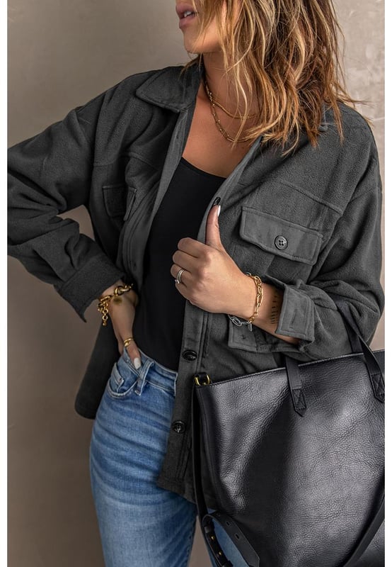 Versatile and stylish Turn Down Collar Buttoned Shirt Jacket
  Made with Quality materials
  Comfortable and flattering fit
  Turn down collar adds a touch of sophistication
  Buttoned design for a chic and modern look
  Perfect for dressing up or keeping it casual