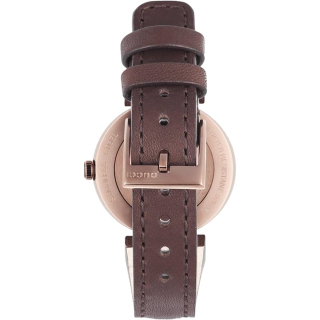 General: Color: Brown Case: Case Size: 29 mmCase Thickness: 6 mmCase Material: Stainless SteelCase Shape: RoundCase Back: Solid Band: Band Material: Calfskin LeatherBand Type: StrapBand Color: BrownBand Length: 7 inchesBand Width: 14 mmClasp: Tang Dial: Dial Color: BrownType: AnalogCrystal: Scratch Resistant SapphireHands: BlackSecond Markers: No Markers. The Gucci name appears below the 12 o'clock position Bezel: Bezel: Fixed Interlocking GBezel Color: Brown PVDBezel Material: Stainless Steel Crown: Crown: Pull / Push Information: Brand: GucciCollection Name: InterlockingGender: Women'sModel: YA133504Watch Label: Swiss MadeMovement: Quartz Features: Water Resistance: 50 meters / 165 feetFunctions: Hour, MinuteWatch Features: Stainless Steel, Leather, Analog Additional Info: Watch Style: LuxuryUPC Code: 731903334441Sku: YA133504Department: WatchesCategory: Watches