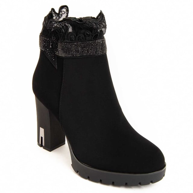 Heeled ankle boots for women. Comfortable fit. Made with vegan materials. Made by other brands for our brand. Approximate measurements: 10 cm heel, 2 cm platform, 13 cm shaft height, and 10 cm shaft width.