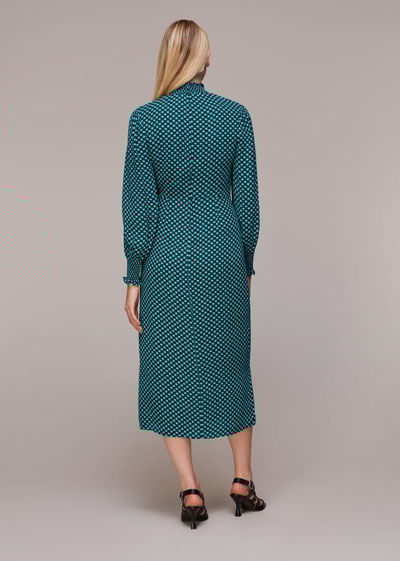 Elevate weekend style with this Star Check Print Midi Dress, perfect for going out. The long-sleeved, green and multicolor design offers a playful yet refined look. Crafted from 100% viscose, it promises ease and comfort without compromising on elegance. Ideal for the fashion-forward individual seeking a blend of casual charm and sophistication.