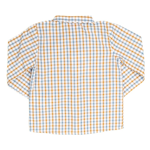 Long-sleeve shirt.
 Lapel collar.
 Button closure at the front.
 Cuff with button closure.
 Seams seen in tone.
 Composition: 100% cotton
 Care:
- Wash at max. 30ºC.
 - Do not use bleach.
 - Iron at low temperature.
 - Supports dry cleaning.
 - Do not use dryer.