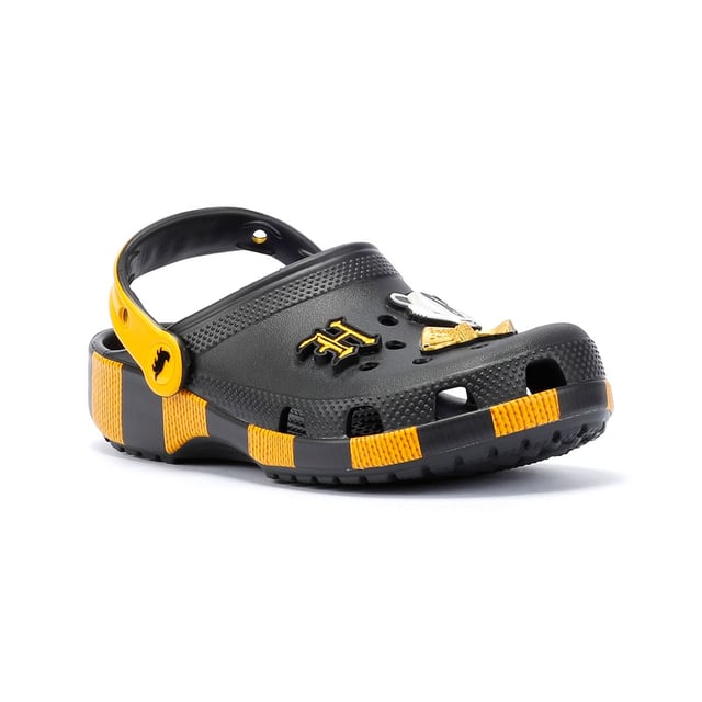 Inspired by Harry Potter’s Hufflepuff House scarf in yellow and black, these Classic Clogs are lightweight, water-friendly, and buoyant. Featuring breathable ventilation ports and pivoting heel straps for a secure fit, they're perfect for fans seeking style and comfort. Customisable exclusive Hufflepuff-inspired Jibbitz™ charms.