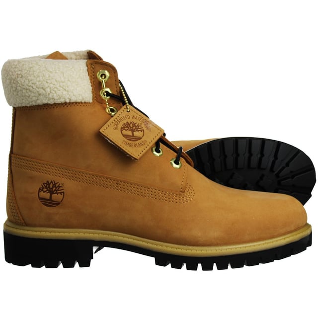The Timberland 6-Inch Premium Men's Boots are a classic and rugged choice for men who appreciate durable and stylish footwear. Here are the key features of these boots:

 Brown Nubuck Leather:  These boots are typically constructed with premium brown nubuck leather, which is known for its durability and resistance to wear and tear. Nubuck leather provides a soft and velvety texture.

 Classic 6-Inch Height:  The 6-inch height is a signature feature of Timberland boots. It provides ankle support and protection, making them suitable for various outdoor activities.

 Waterproof Construction:  Timberland is renowned for its waterproof boots, and the 6-Inch Premium Boots are no exception. They often feature seam-sealed construction and waterproof leather to keep your feet dry in wet conditions.

 Padded Collar and Tongue:  These boots come with a padded collar and tongue for enhanced comfort and to reduce the risk of chafing or discomfort during extended wear.

 Lace-Up Closure:  The boots typically feature a lace-up closure system with rustproof hardware, allowing for a secure and customized fit and ensuring durability over time.

 Anti-Fatigue Technology:  Some Timberland boots, including the 6-Inch Premium line, feature anti-fatigue technology in the midsole. This technology provides all-day comfort and support, especially during long walks or hikes.

 Rubber Lug Outsole:  The rugged rubber lug outsole offers excellent traction and grip on various surfaces, making these boots suitable for outdoor adventures.

 Versatile Use:  While originally designed for outdoor and workwear, these boots have become a fashion statement and can be worn in various casual and urban settings.

 Timberland Branding:  These boots feature Timberland branding details, such as the iconic Timberland tree logo on the side and embossed branding on the tongue, representing the brand's reputation for quality and style.

In summary, the Timberland 6-Inch Premium Men's Boots are a durable and stylish choice for men who want both fashion and function in their footwear. With their waterproof construction, comfortable features, and iconic design, they are a versatile addition to your wardrobe, suitable for both outdoor activities and everyday wear. These boots are a classic symbol of Timberland's commitment to quality and rugged style.