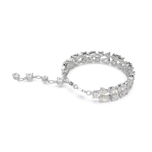 This dazzling Bracelet for Women from Swarovski is the perfect gift to spoil yourself or a loved one. The Bracelet is made out of Base Metal, colored Silver at Length: 19.5 cm weighing in at  grams with a Width of 1.4 cm at its widest point. The Swarovski 'Mesmera' Women's Base Metal Bracelet - Silver 5669927 is delivered in a stunning gift box and carries a two year warranty.