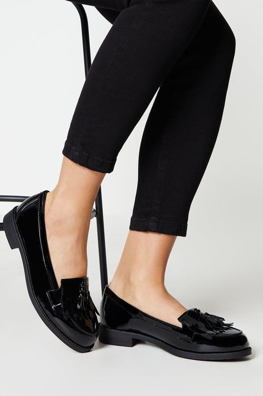 Whether you're dressing up for a formal occasion or looking to elevate your everyday style, this loafer is the perfect choice. Step out in confidence and make a statement with our timeless fringed tassel loafer.