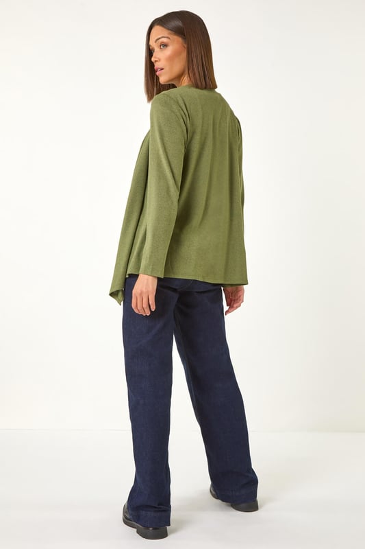 Waterfall Stretch Cardigan from Roman. Add a touch of cosiness to your Autumn/Winter wardrobe with this stylish waterfall cardigan. Designed with a wooly touch, this cardigan features long sleeves for extra warmth. Perfect for layering over a simple t-shirt and jeans for a chic and casual look that will keep you snug all season long!
