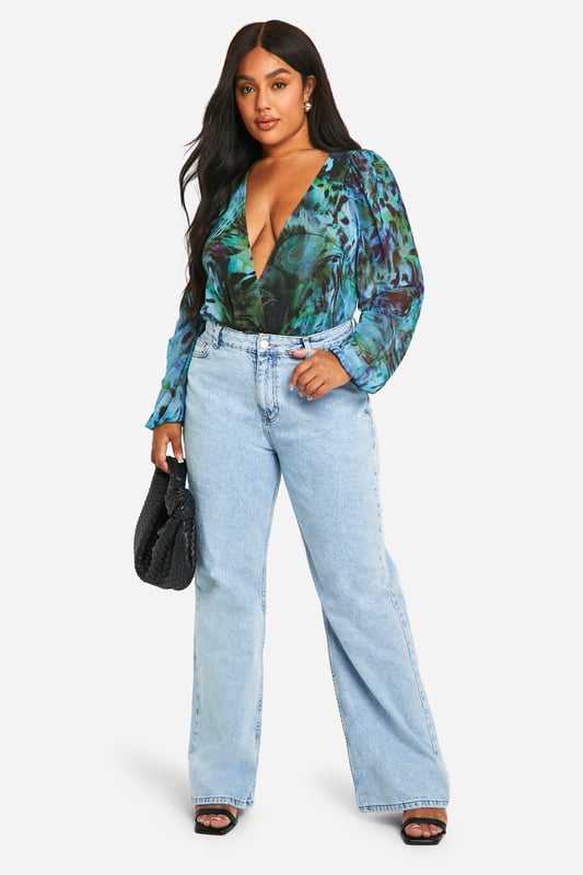 Plus Animal Wrap Mesh Bodysuit Update your wardrobe with this plus size bodysuit from our dedicated curve range. A form fitting, curve enhancing style with a press-stud fastening, this piece can be dressed up or down, depending on the vibe. Team with coated jeans and statement heels for date night plans, or pair with tailored trousers for a brunch date with your bestie. For an instant fresh 'fit, a plus size black bodysuit is perfect to replace your go-to t shirts. Got a date night planned? Team a dreamy plus size lace bodysuit with a leather skirt and standout heels.Style: BodysuitDesign: AnimalSleeve Length: Long Sleeve