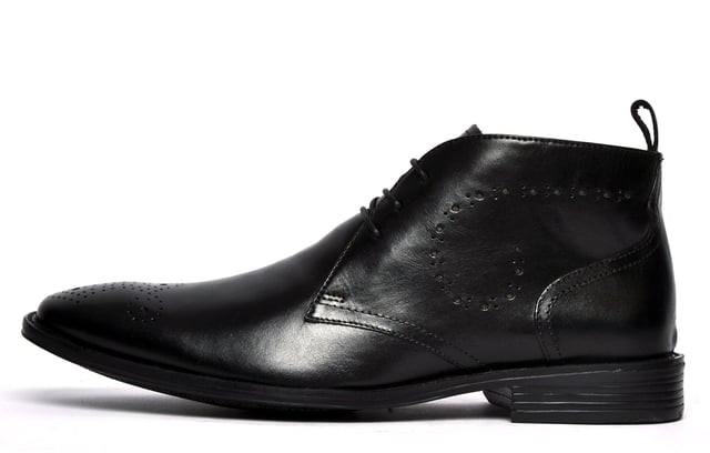 Combining brogue styling and a chukka boot silhouette with premium craftmanship, these Catesby England Belfry mens boots are a true must have, designed for a contemporary on-trend package. These Belfry mens brogue inspired chukka boots are the perfect match for your formal and casual wear. Crafted using a high-end leather upper, durable rubber outsole, and intricate stitch and hole-punch detailing, these boots are designed to impress.
 - Premium leather upper
 - Heel tab for easy on / off
 - 3 eyelet lace up fastening
 - Chukka boot silhouette
 - Soft textile lining
 - Brogue detailing
 - Durable rubber outsole 
 - Catesby England branding