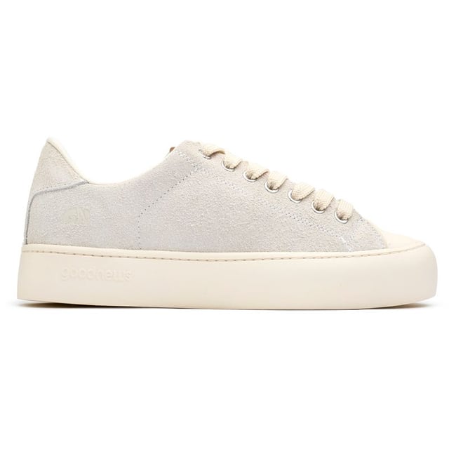 Step Up Your Eco-game With The Good News Slimer Trainers. Sporting A Sleek Natural Hue, These Court-inspired Kicks Boast A 100% Recycled Mesh Lining, Ensuring Your Steps Tread Lightly On The Planet. Crafted With Breathable, Cushioned Footbeds And A Unique Round-toe Shape, They Offer Unmatched Comfort. The 100% Copper Eyelets Add A Refined Touch, While The Robust Rubber Soles Promise Enduring Style. Stride With Pride In These Sustainable Standouts That Don't Compromise On Looks Or Values.