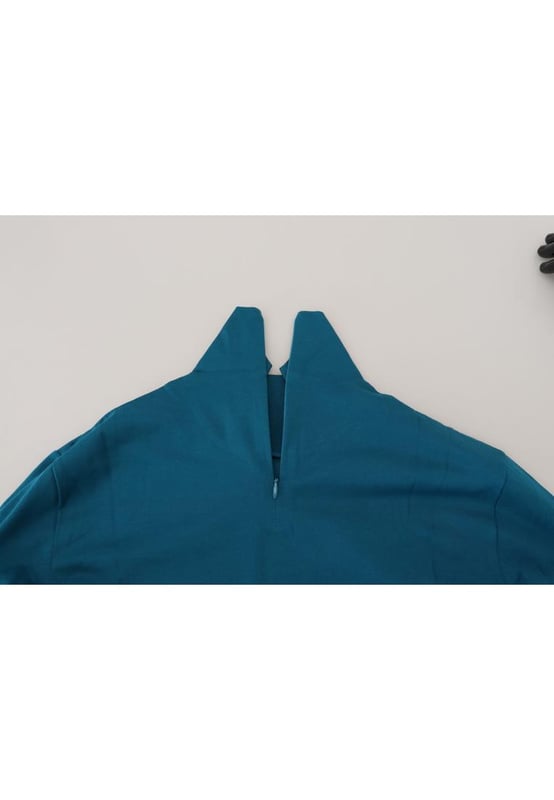 100% Authentic Dolce \\u0026 Gabbana Collared pullover sweater.\\n  Brand new with tags.\\n  Model: Collared pullover sweater.\\n  Colour: Blue.\\n  Logo details.\\n  Made in Italy.\\n  Material: 100% Cotton.
