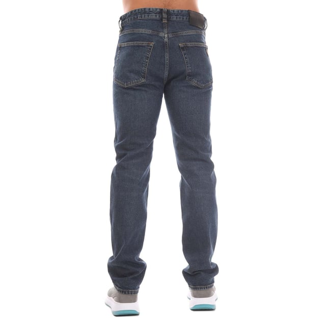 Mens Belstaff Longton Regular-Fit Jeans in indigo.- Button waist with zip fly.- Signature tilted coin pocket.- Front hip pockets.- Back pockets.- Direct embroidered phoenix patch on rear pocket.- Branded leather patch.- Modern gunmetal hardware.- 99% Cotton  1% Elastane.- Ref: 105563WSIND