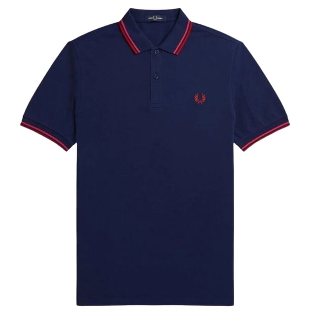 Fred Perry Blå pikétröja, mönster på krage, knäppning i nacken. 100 % bomull, kortärmad, blå polo