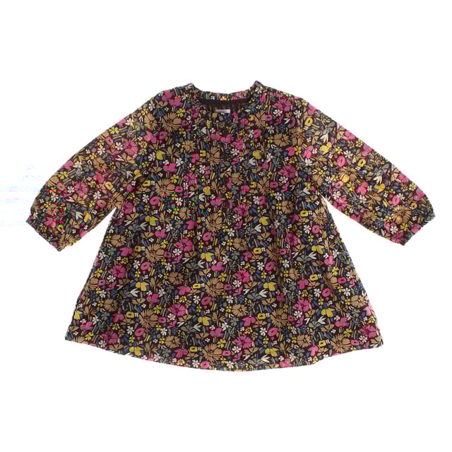 This bohemian style dress is the perfect combination of style and functionality.

 Its cheerful floral print runs throughout the garment, providing a vibrant and natural touch.

 The round neckline with Henley-style button placket gives it a casual, practical feel, while delicate ruching at the front adds a romantic, textured detail.

 Long sleeves with elastic cuffs provide comfort and a flattering fit.

 Additionally, the dress features two discreet side pockets, offering a practical touch, and is fully lined, ensuring added comfort and opacity.

 Ideal for any occasion, it combines bohemian style with functional details that make it perfect for everyday wear.
 Composition: Exterior: 100% Cotton; Interior: 100% Cotton
 Care:
- Machine wash max 30ºC and delicate cycle.
 - Use mild detergents.
 - Use dryer at low temperature.
 - Iron at low temperatures.
 - Do not dry clean.