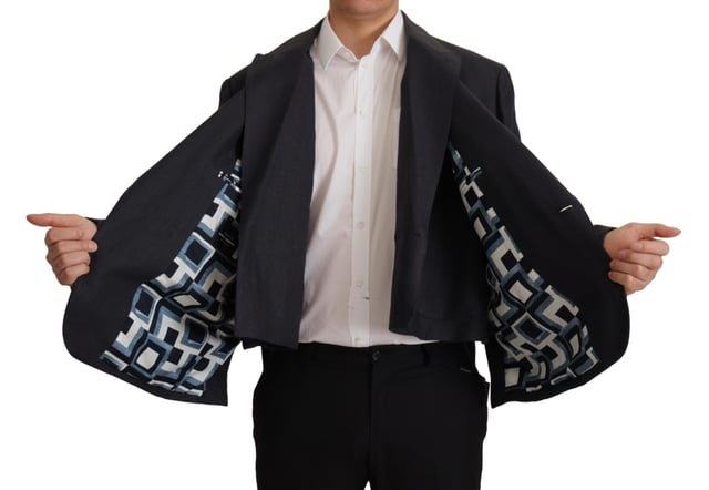 Model: Blazer jacket sport coat
  Style: Double breasted one button
  Fitting: Slim
  Colour: Dark blue
  Three outside pockets and two inside pockets
  One open vent in the back
  Logo details
  Made in Italy
  Material: 100% Linen
  Lining: 100% Silk
Material: 100% Linen