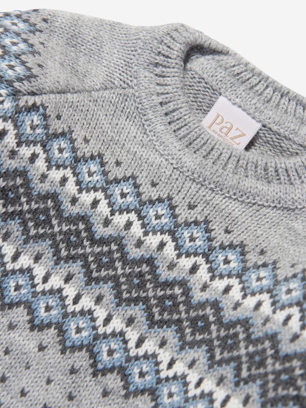 Elevate your boy's wardrobe with the exclusive Boys Wool Knitted Jumper in Grey by Paz Rodriguez. Key Features are: Spanish Craftsmanship: Meticulously designed and crafted in Spain, promising durability and longevity.  Chic Design: Adorned with a distinct print, adding a dash of playful flair to this high-end jumper. Luxe Comfort: Constructed with plush, premium wool ensuring optimum comfort for your boy's day-to-day escapades. Style Upgrade: This wool knitted jumper in a classy shade of grey will instantly revamp your boy's wardrobe, letting them make a stylish statement.