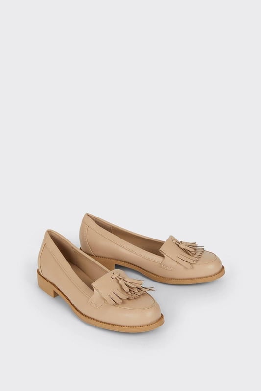 Faux leather loafers with a wide fit for added comfort
Sleek and polished design with a fringed tassel detail
Flat sole offers a versatile wear from day to night
Slip-on style for easy on and off
Synthetic lining and outsole for durability

Exude effortless sophistication with these Wide Fit Leigh Fringe Loafers from Dorothy Perkins. The faux leather construction lends a luxurious touch, while the fringed tassel detail adds a playful twist to the classic silhouette. Designed with a wide fit, these loafers offer ample room for all-day comfort. Pair them with tailored trousers for a polished office look or team them with a flowy dress for a chic weekend ensemble. Their flat sole ensures versatility, allowing you to transition seamlessly from desk to dinner.