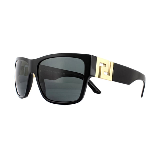 Versace Sunglasses VE4296 GB1/87 Black Grey are a bold square shape that features a sculpted metal Versace Greca logo at the hinges. The large metal logo contrasts perfectly against the acetate frame and creates an edgy look.