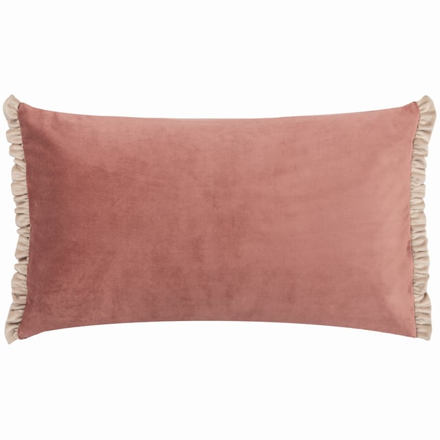 The Tilly cushion is made entirely of soft, opulent velvet and comes in a variety of soft pastel colours to help create a sophisticated look for your sofa. The dual-sided cottage core frill trim adds gravitas to the design, making it easy to combine with other larger cushions as part of a larger design scheme.