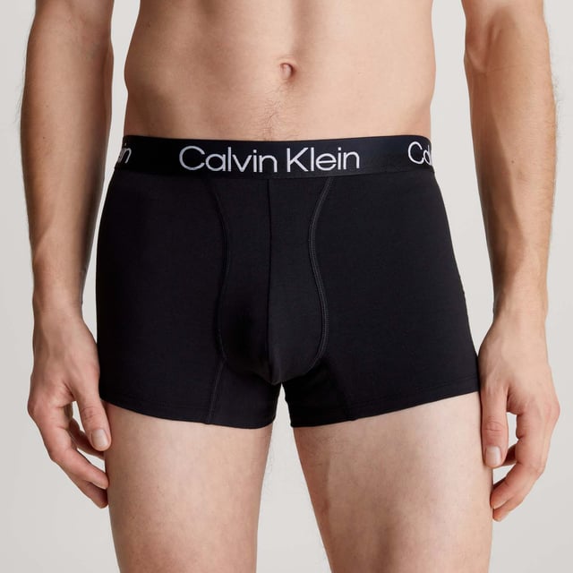 Mens Calvin Klein 3 Pack Trunks in blue.- Branded elasticated waistband.- Cotton stretch fabric.- Low rise.- Classic fit.- 95% Cotton  5% Elastane.- Ref: 000NB2970AMCAWaist: - S = 28-30in- M = 32-34in- L = 36-38in- XL = 40- 42in