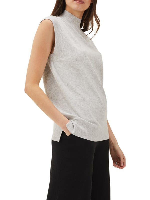 A chic and contemporary separate our fine knit Kitta tank top offers a relaxed take on minimalist elegance. We're styling ours with black jersey culottes and white trainers for an effortless off-duty look.