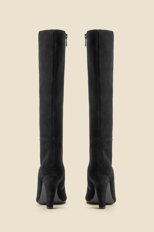 Every wardrobe needs a pair Crafted from butter-soft suede Set on a chunky curved heel for day-to-night comfort Wear-forever knee-high silhouette Slip over skinnies Style with a printed midi dress